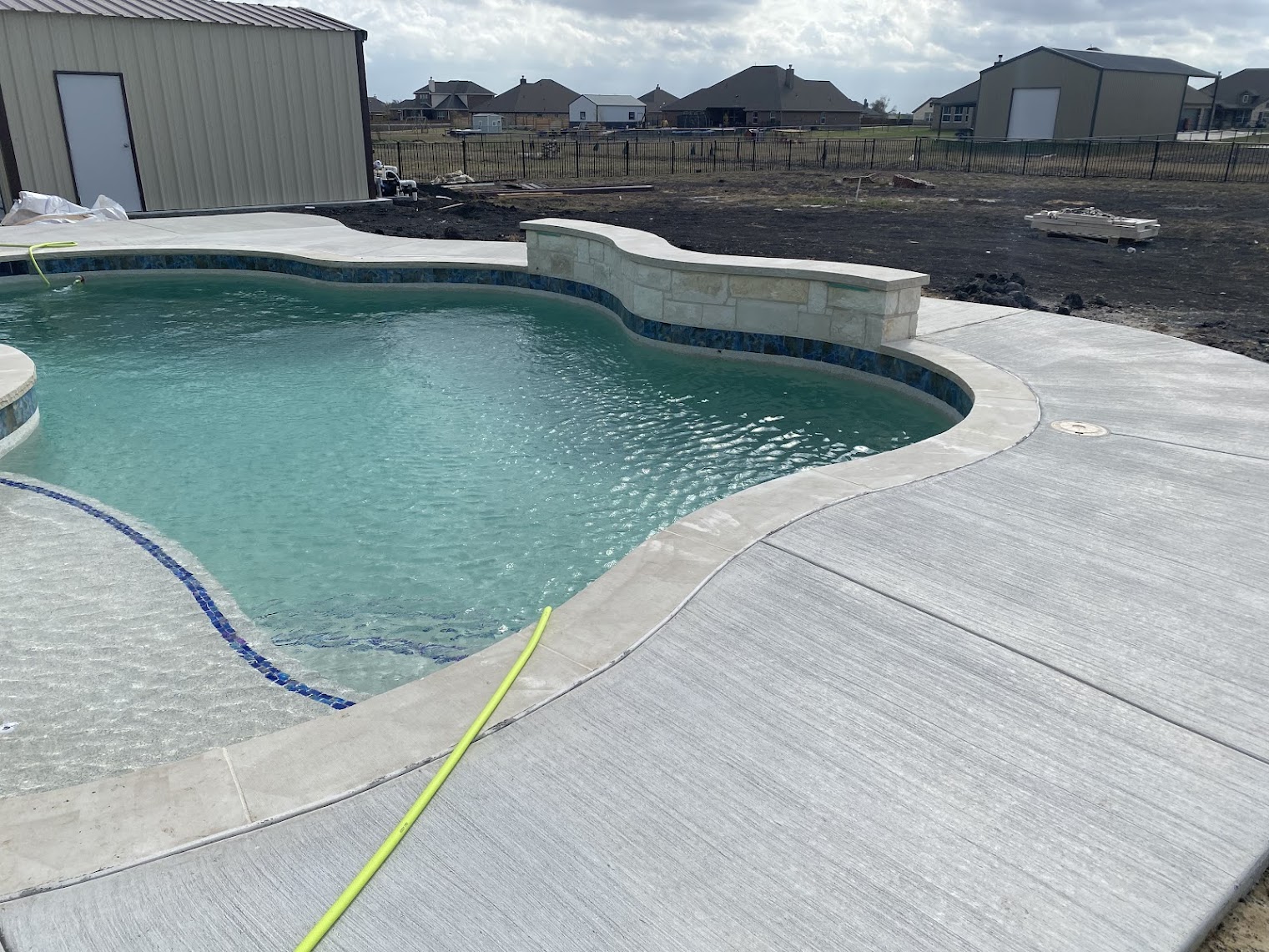 Modern Backyard Pool & Patio Remodel in Kermit